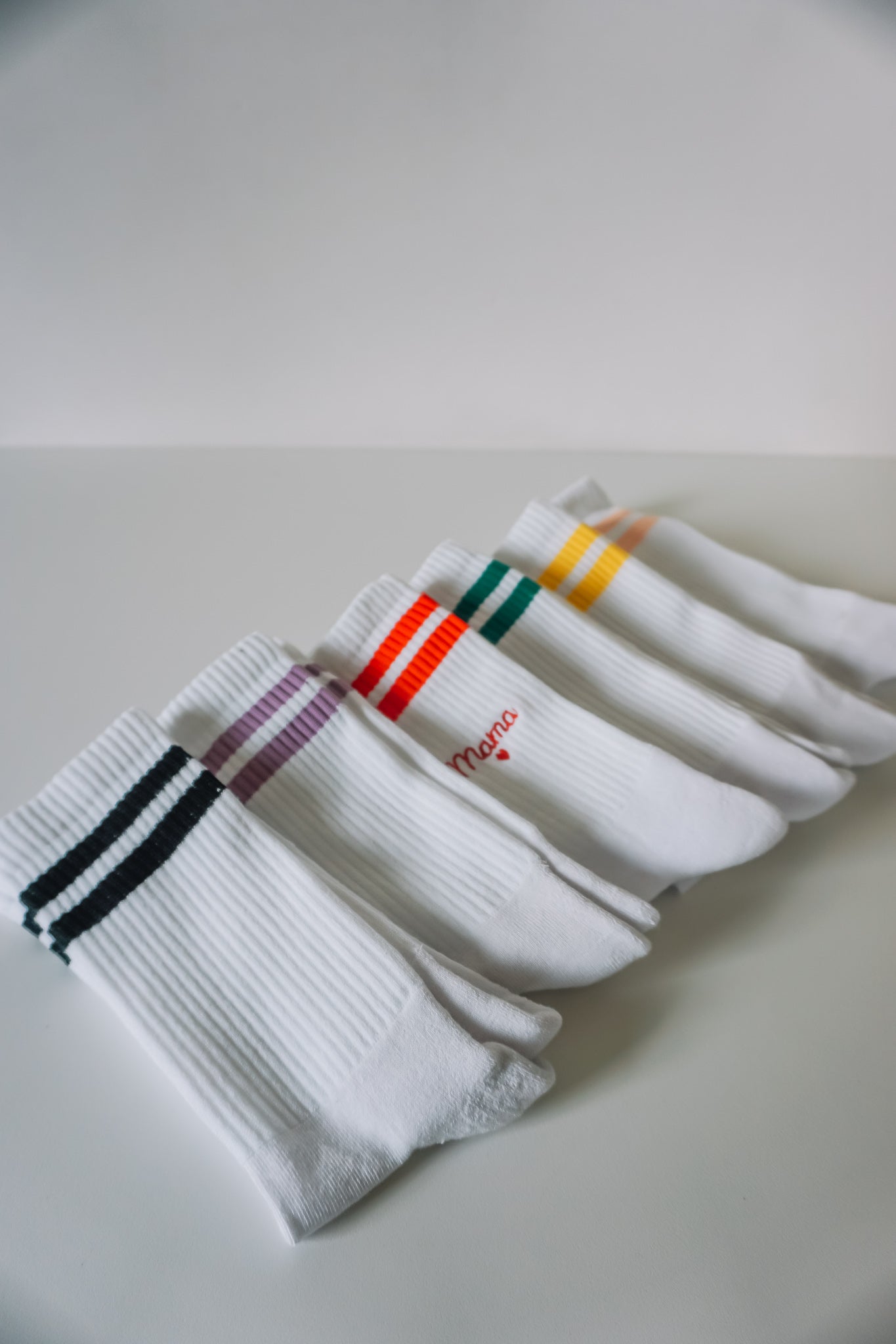 Geborduurde sportkousen met kleurband