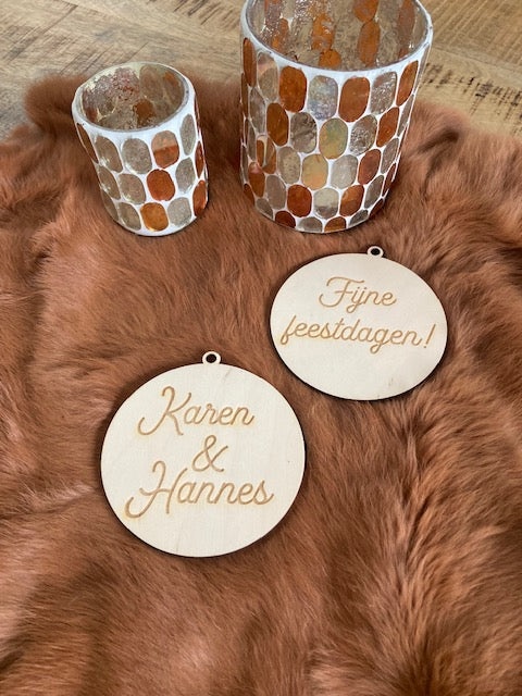 Houten kerstbal met boodschap