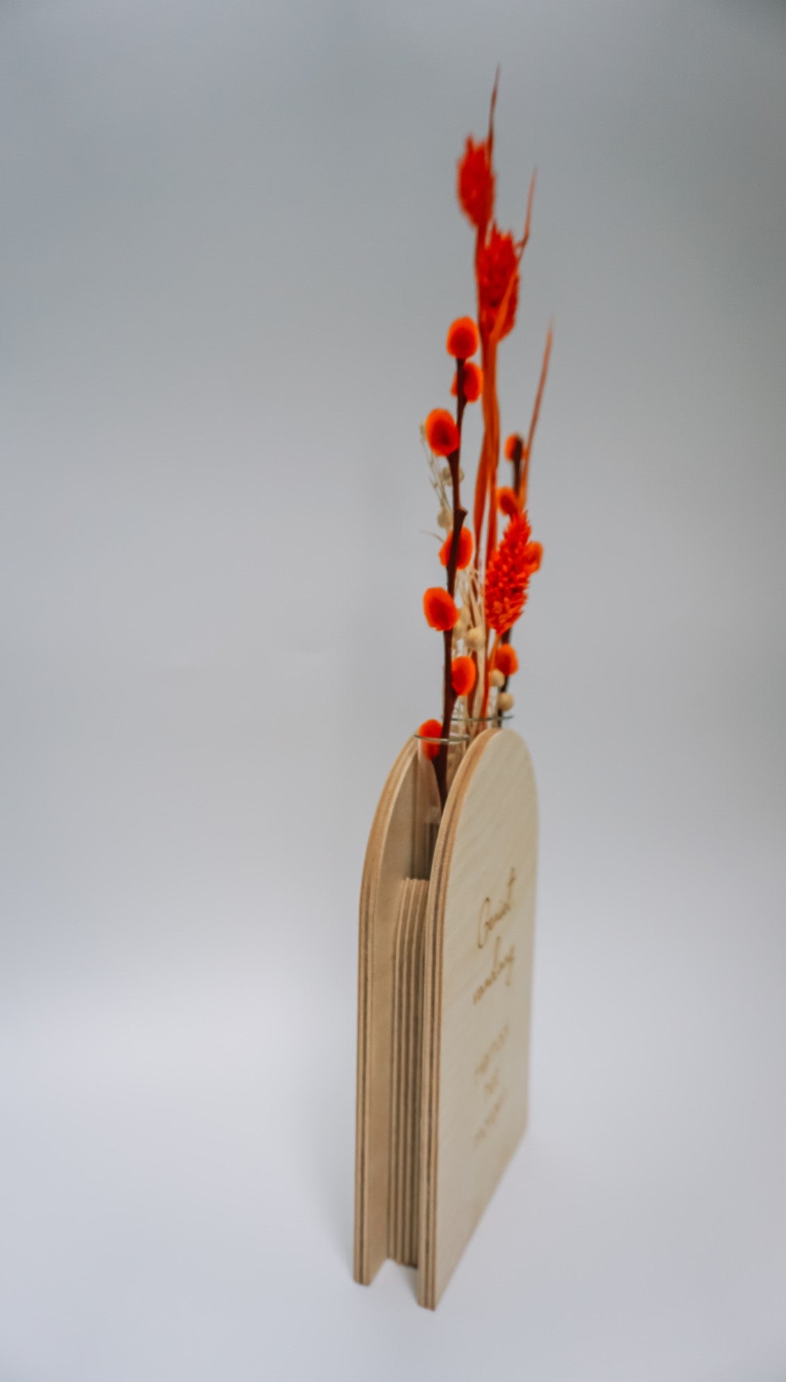 Houten vaas half gebogen