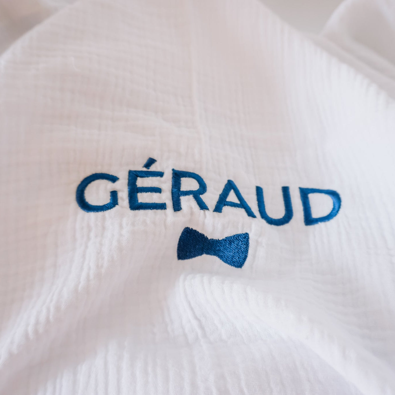 Tetradoek geborduurd met naam