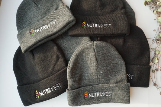 Geborduurde mutsen voor Nutriwest